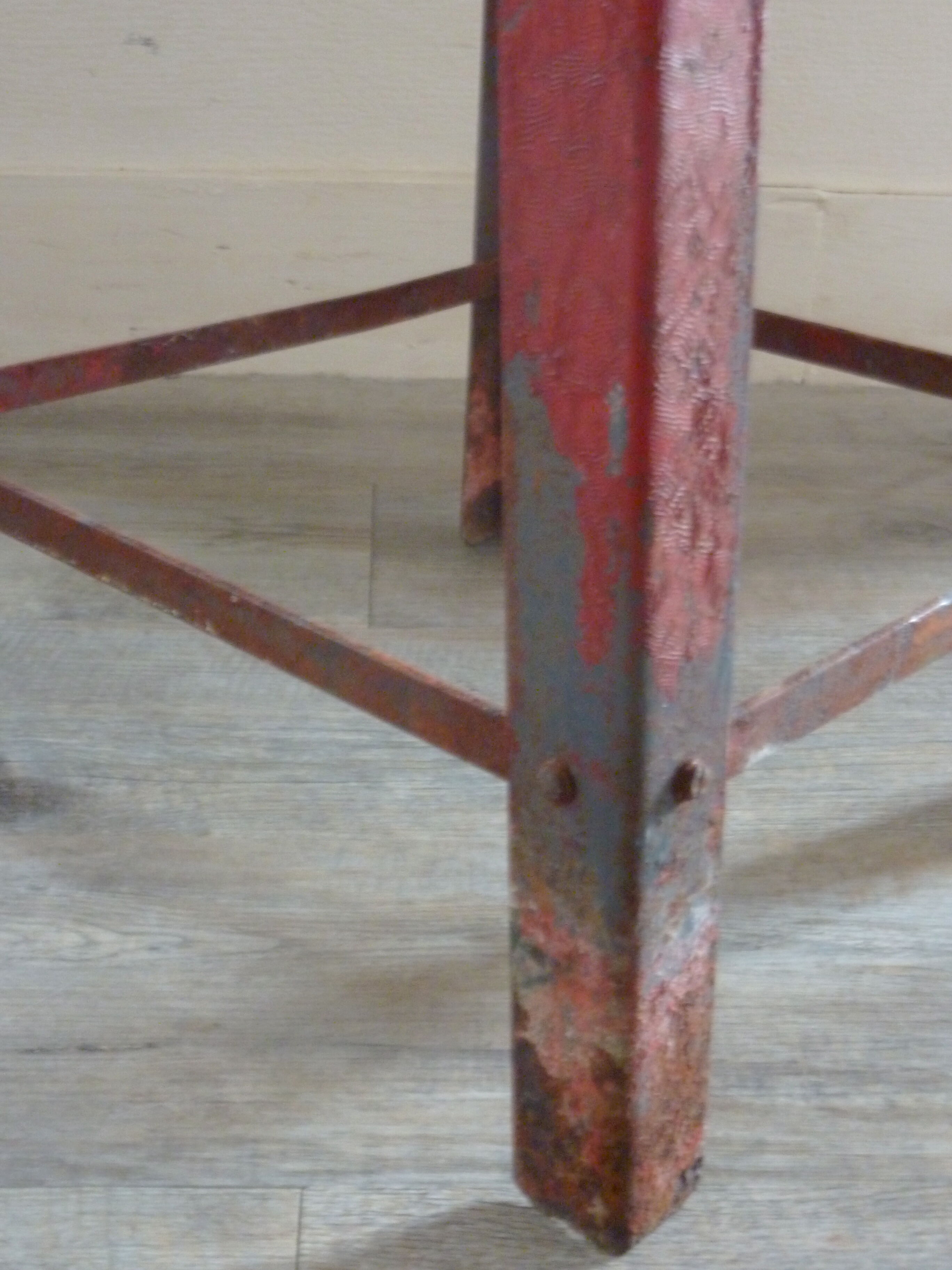 Red metal workshop stool