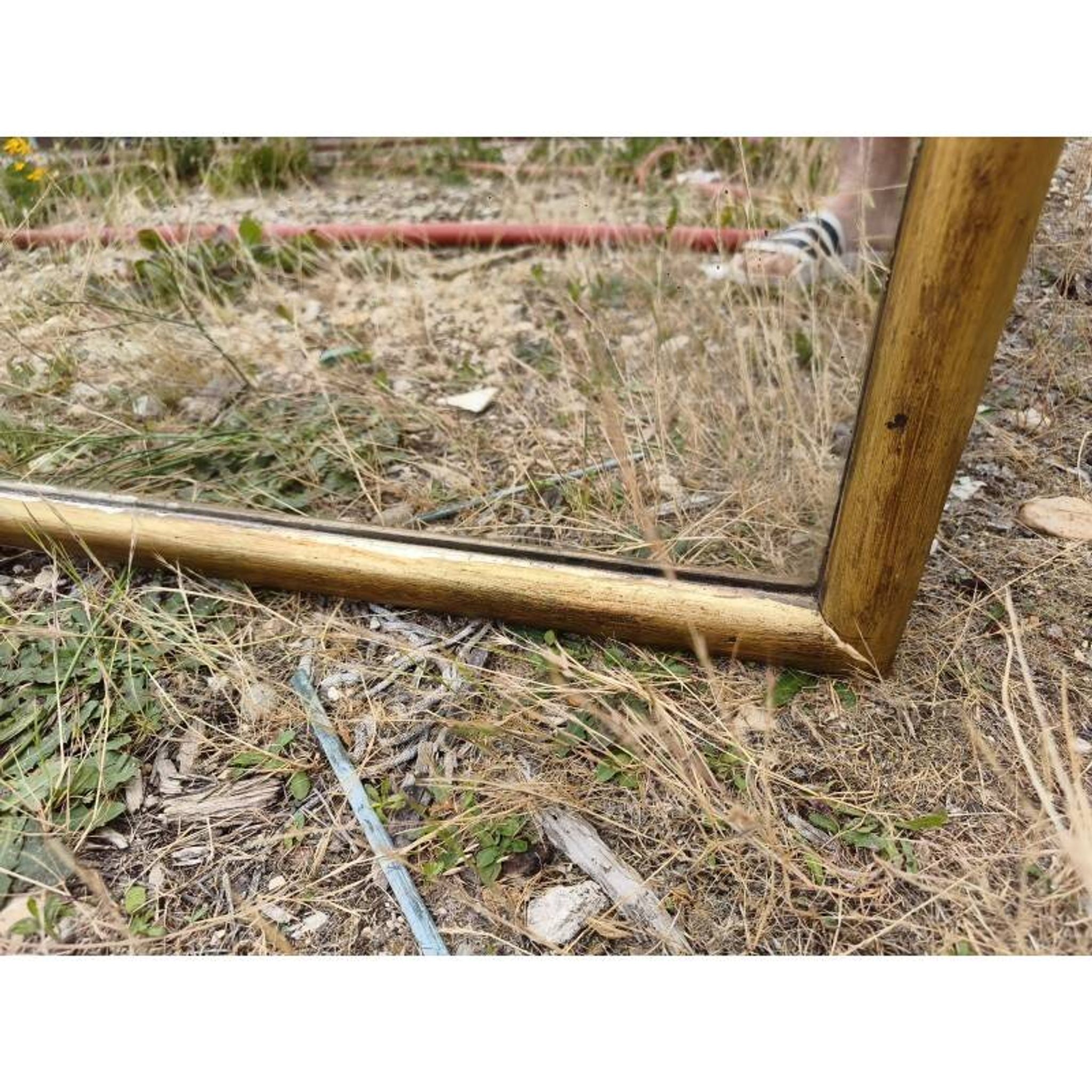 Grand miroir début 20ème bois et stuc doré