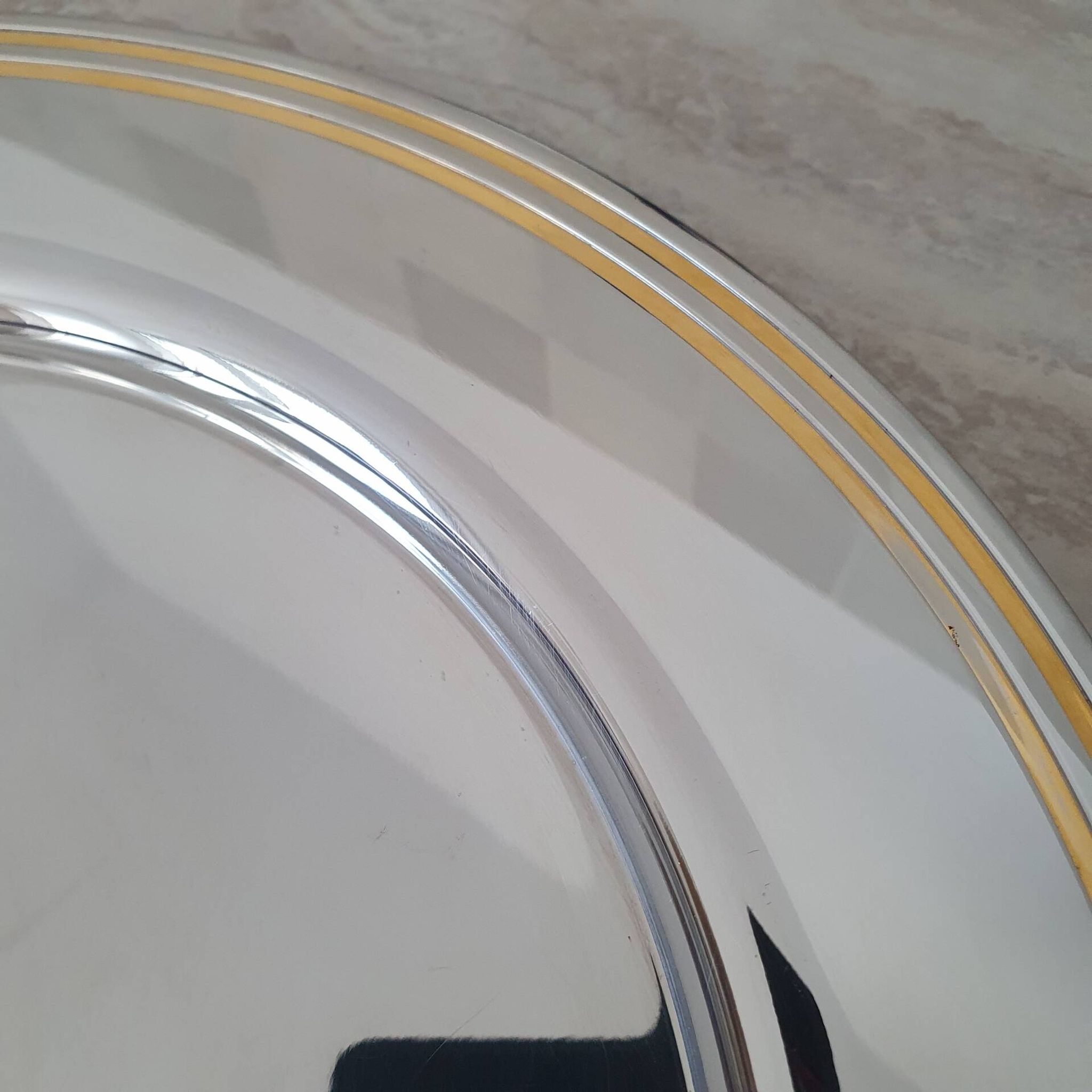 Alessi Ettore Sottsass / Serving plate in stainless steel 18/10 and gold NG5100