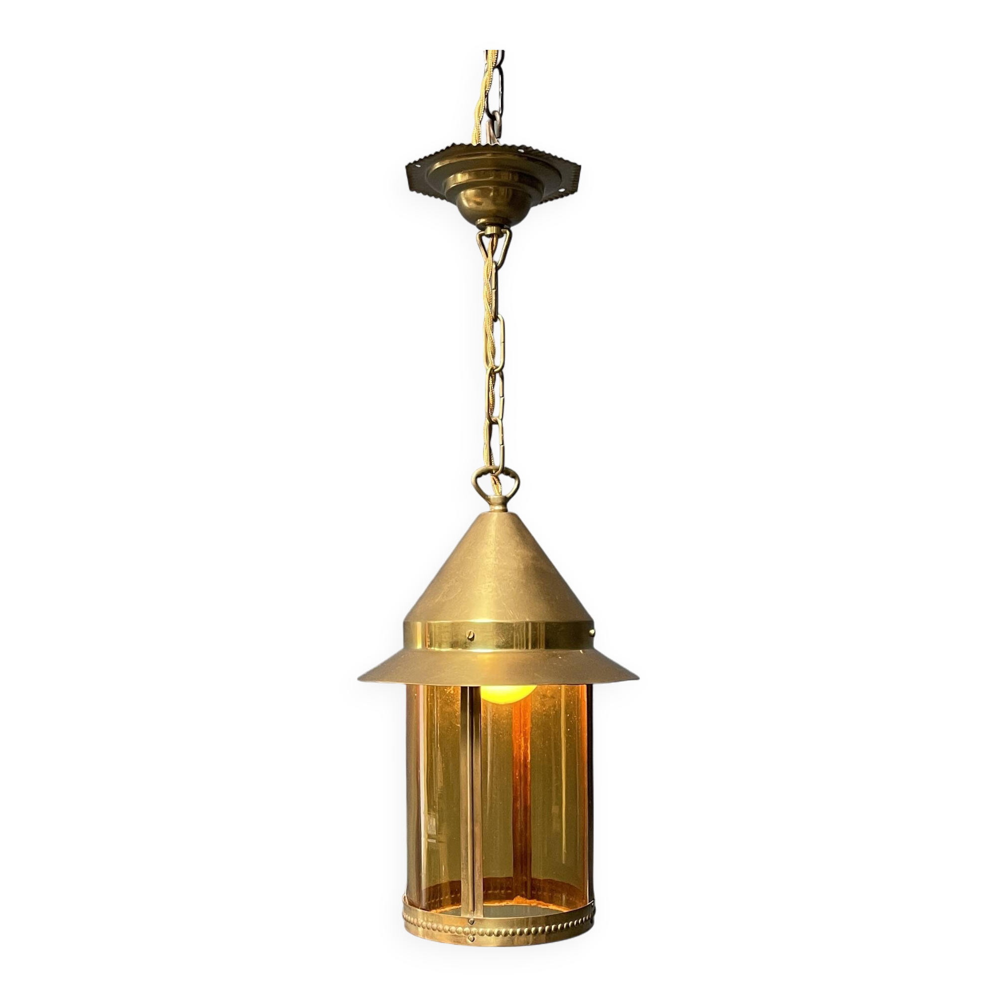 Brass lantern pendant lamp with yellow glass