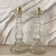 Paire de bougeoirs en verre flacons roger gallet