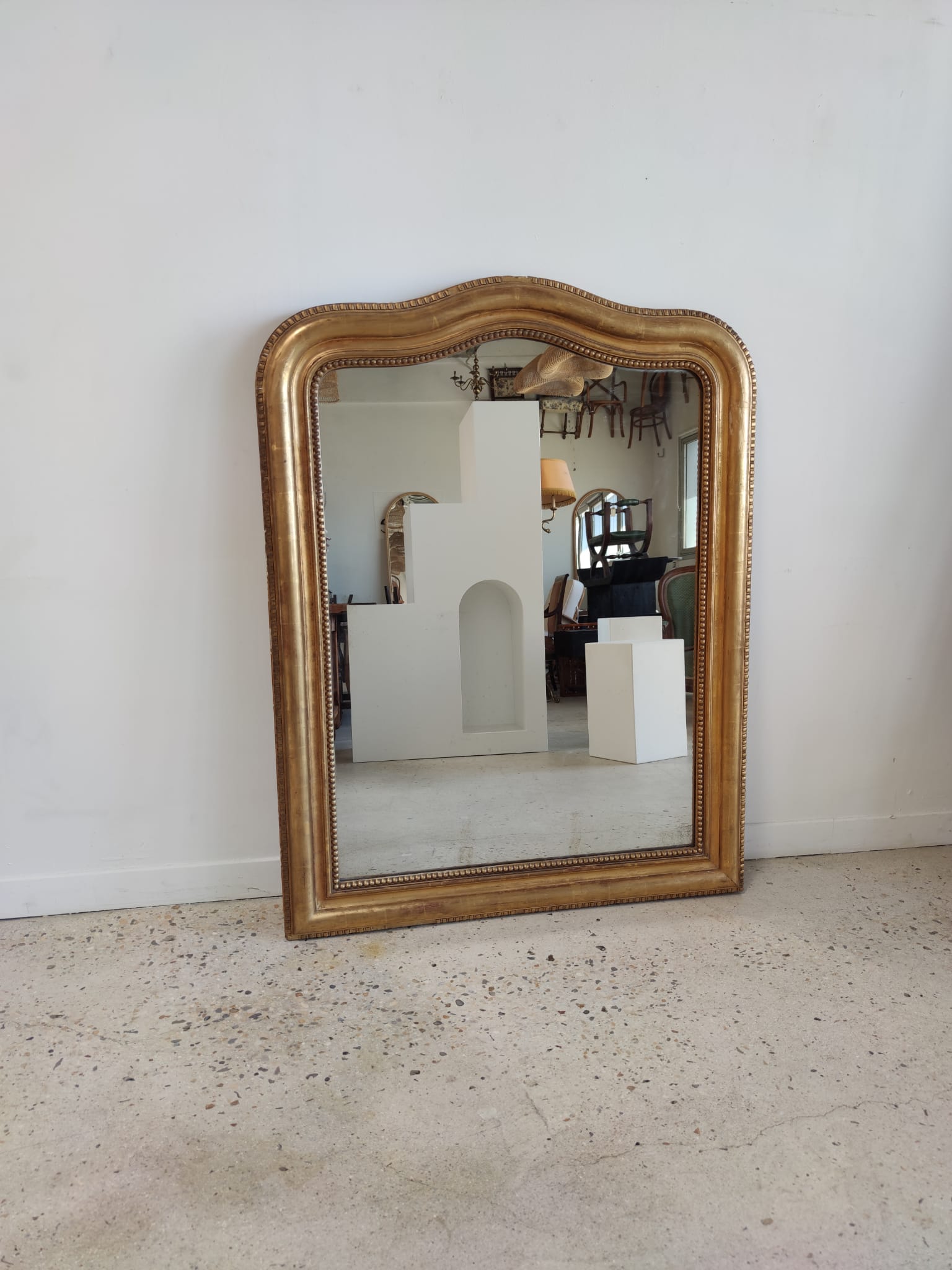 Louis Philippe gilded mirror with gendarme hat nineteenth H:130cm