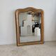 Louis Philippe gilded mirror with gendarme hat nineteenth H:130cm