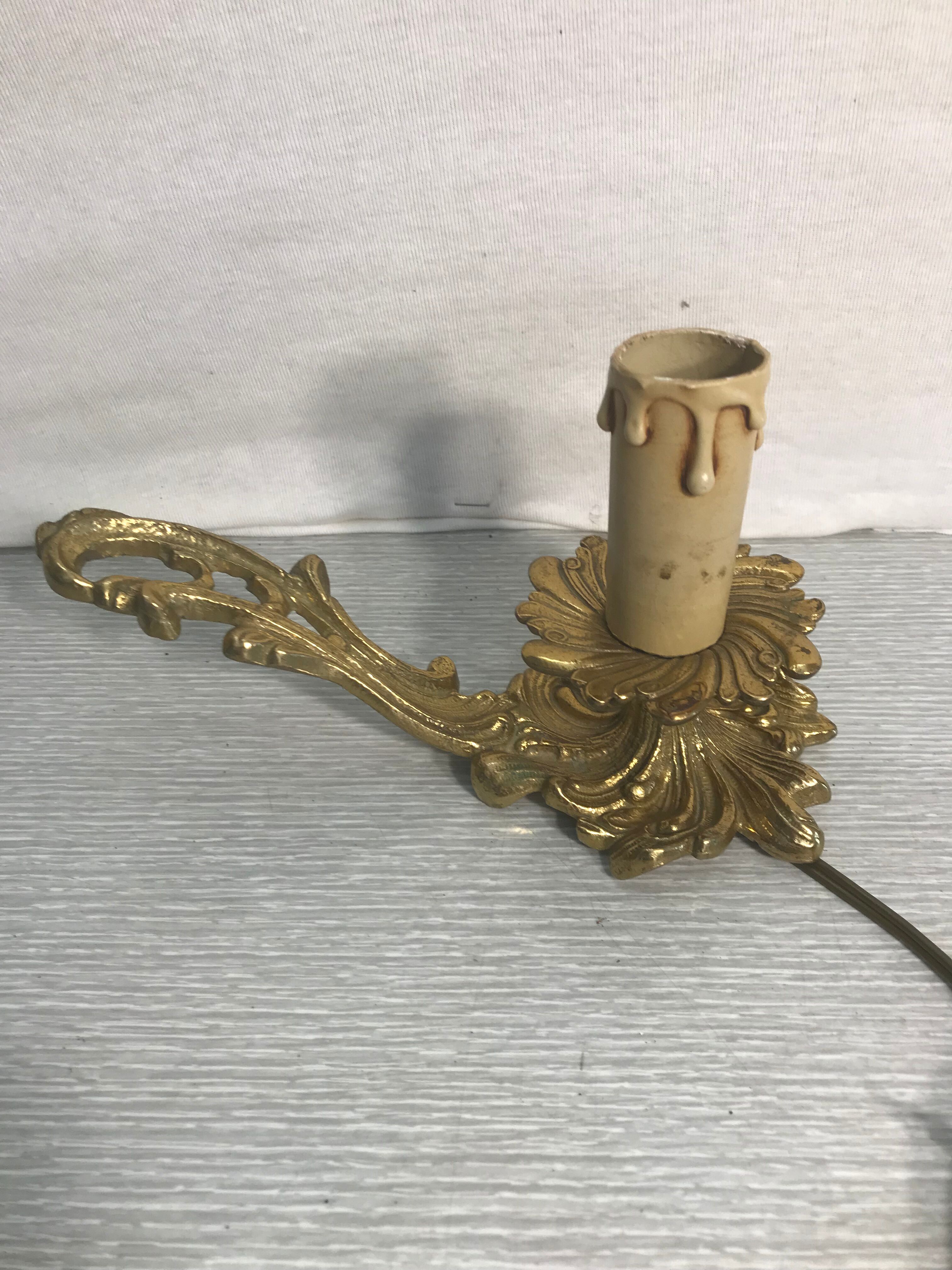 Former hand candleholder in golden bronze electrified vintage lamp