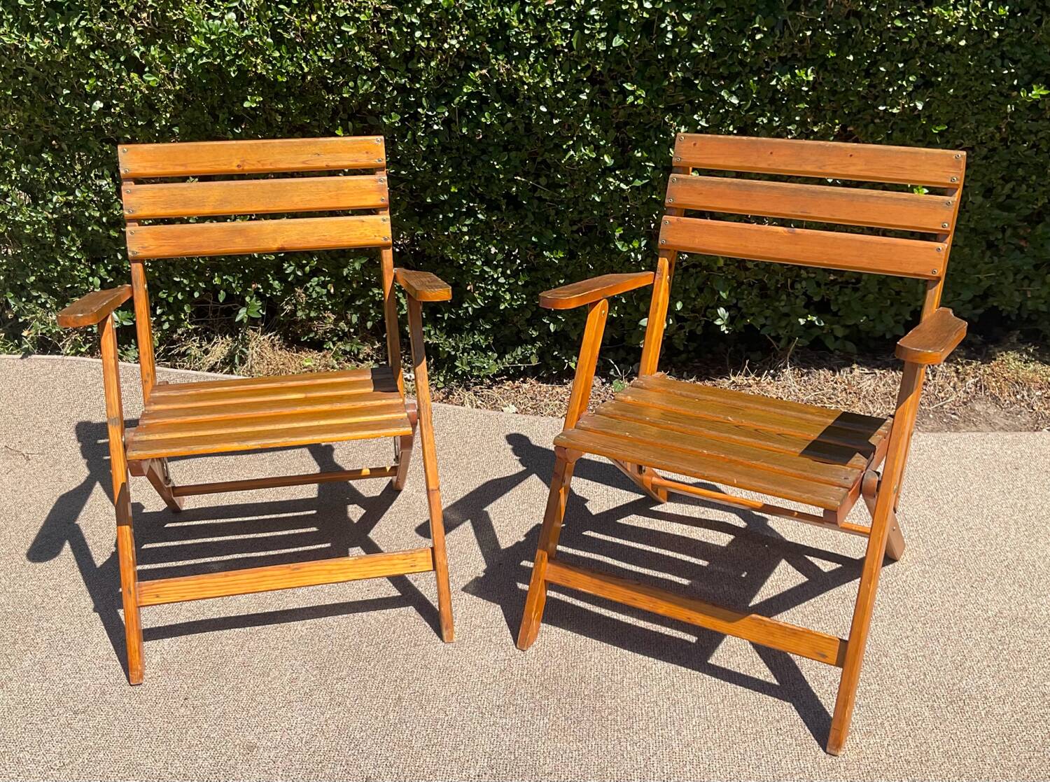 Pair of vintage wooden folding armchairs