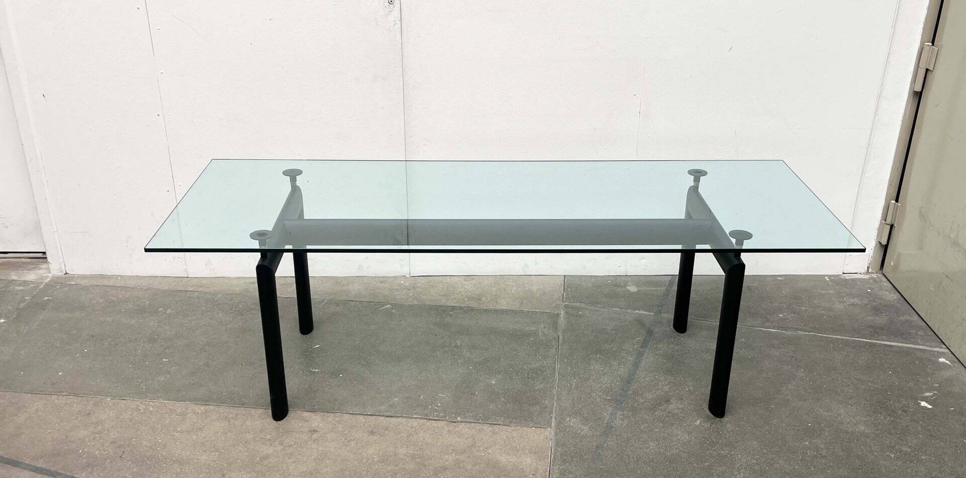 Italian model LC6 dining or office table in metal and glass by Le Corbusier, Pierre Jeanneret, Charlotte Perriand for Cassina.