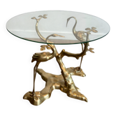 Coffee table model with cranes surrounding a brass bonsai and round glass top by Willy Daro.