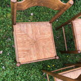 4 wood and straw chairs