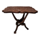 Coffee table with knotted wooden legs in an African pattern