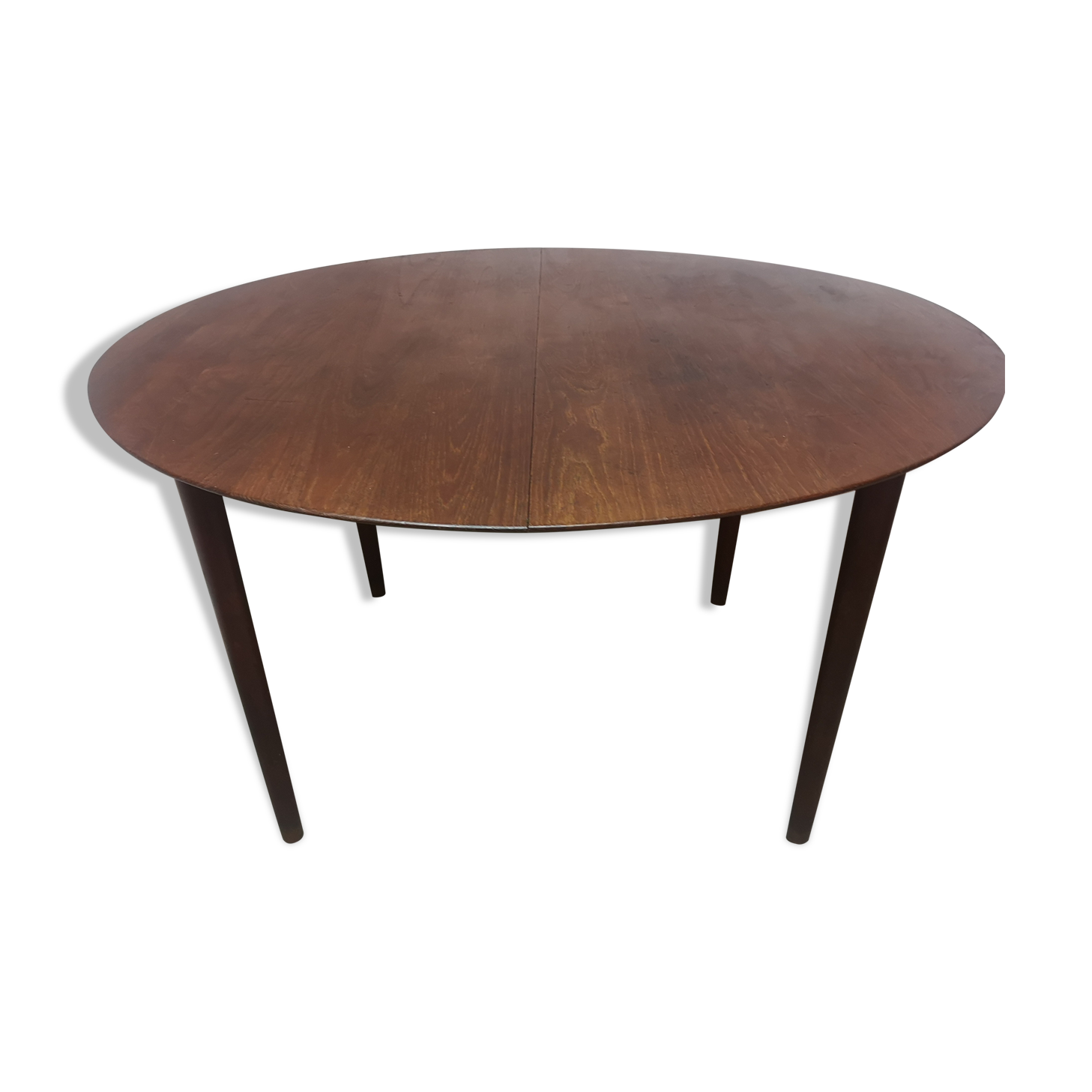 Scandinavian extendable round dining table in teak