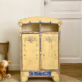 Antique doll's wardrobe