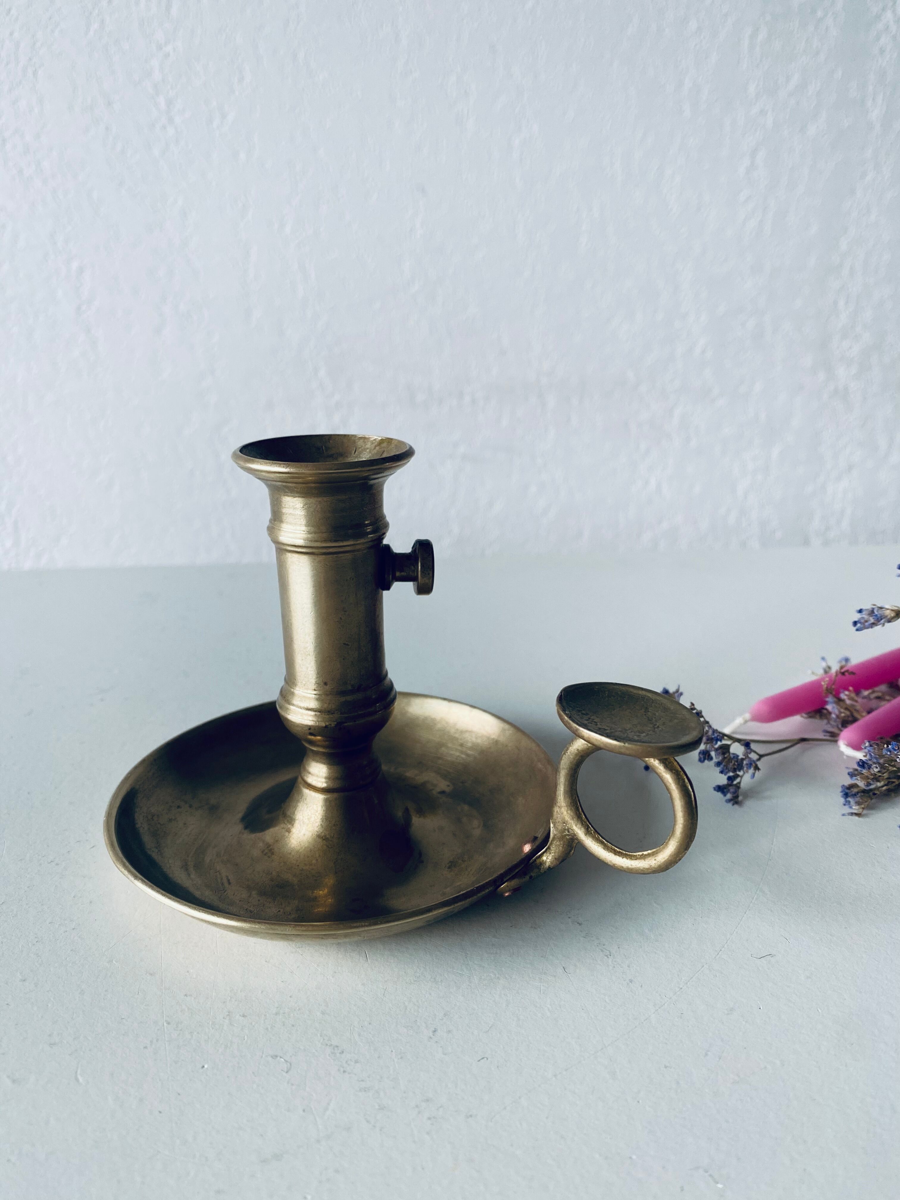 Antique brass candle holder