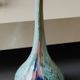 Ball vase soliflore with a long chimney neck. In speckled glass in the Murano style.