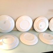 Set of six flat plates and one Moulin des Loups bowl, green tablecloth model/1950s-1960s