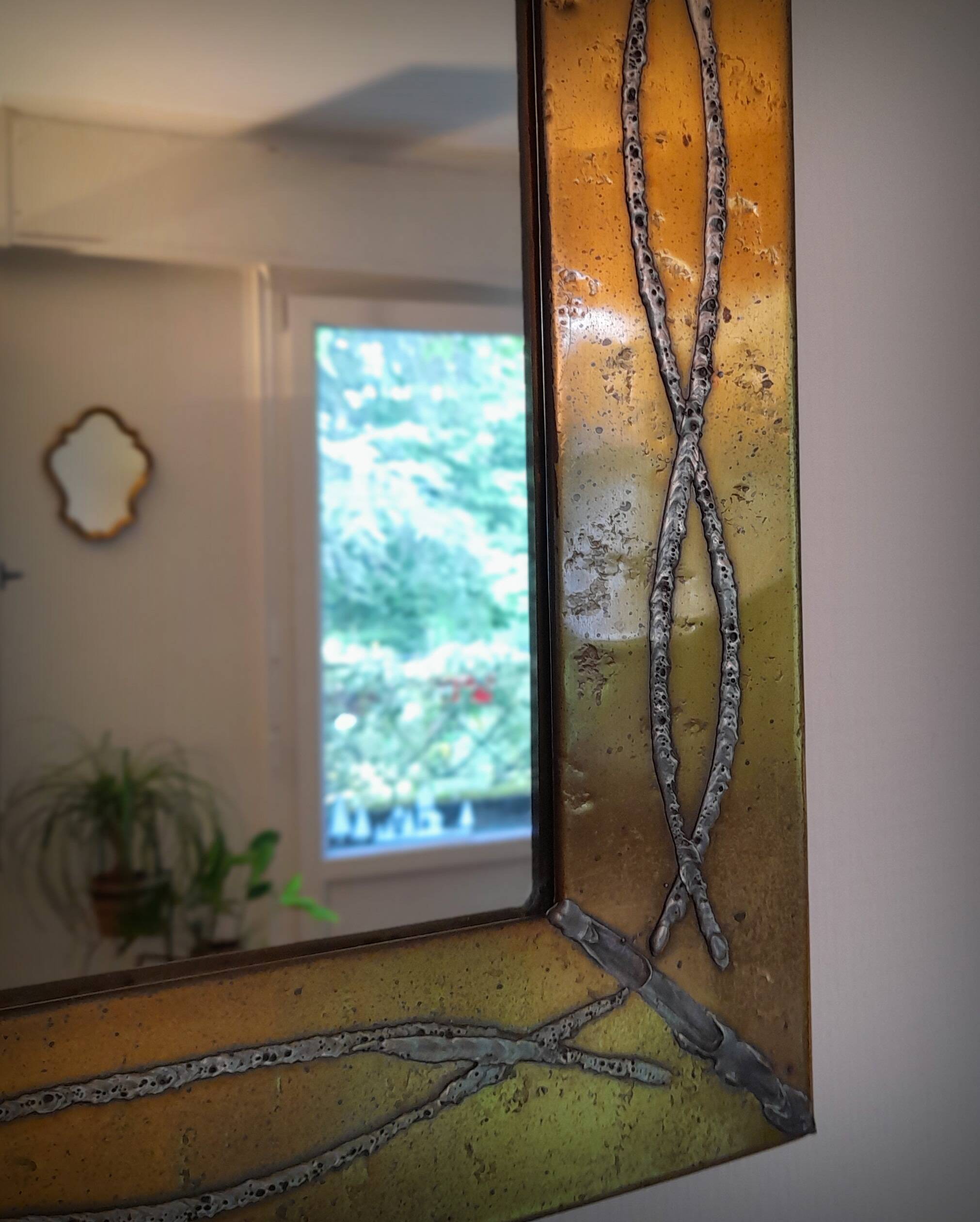 Brutalist brass mirror by Jean Goardere, France, 1970s