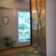 Brutalist brass mirror by Jean Goardere, France, 1970s