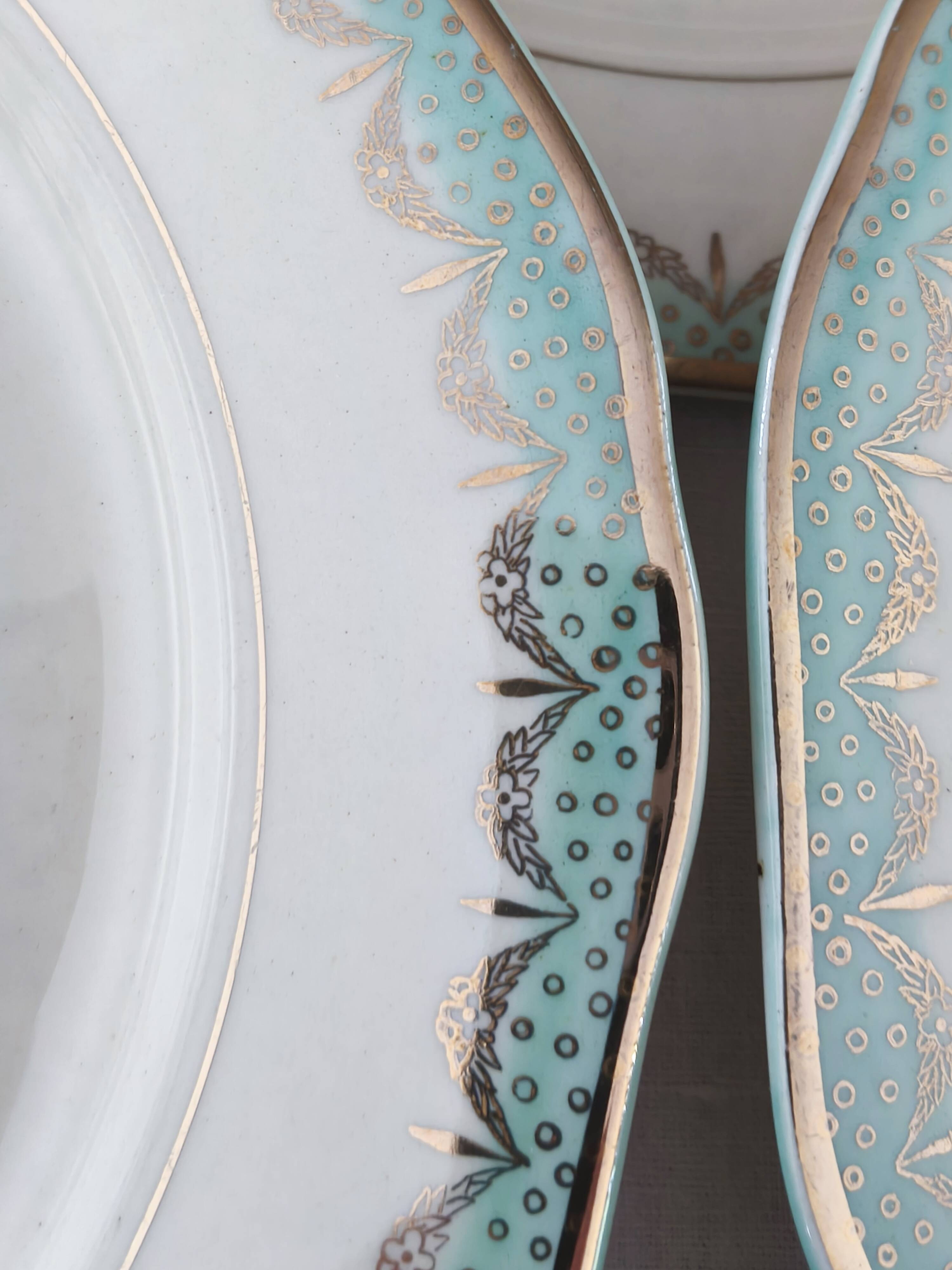 Set of 11 Longwy France earthenware dinner plates, Trianon model