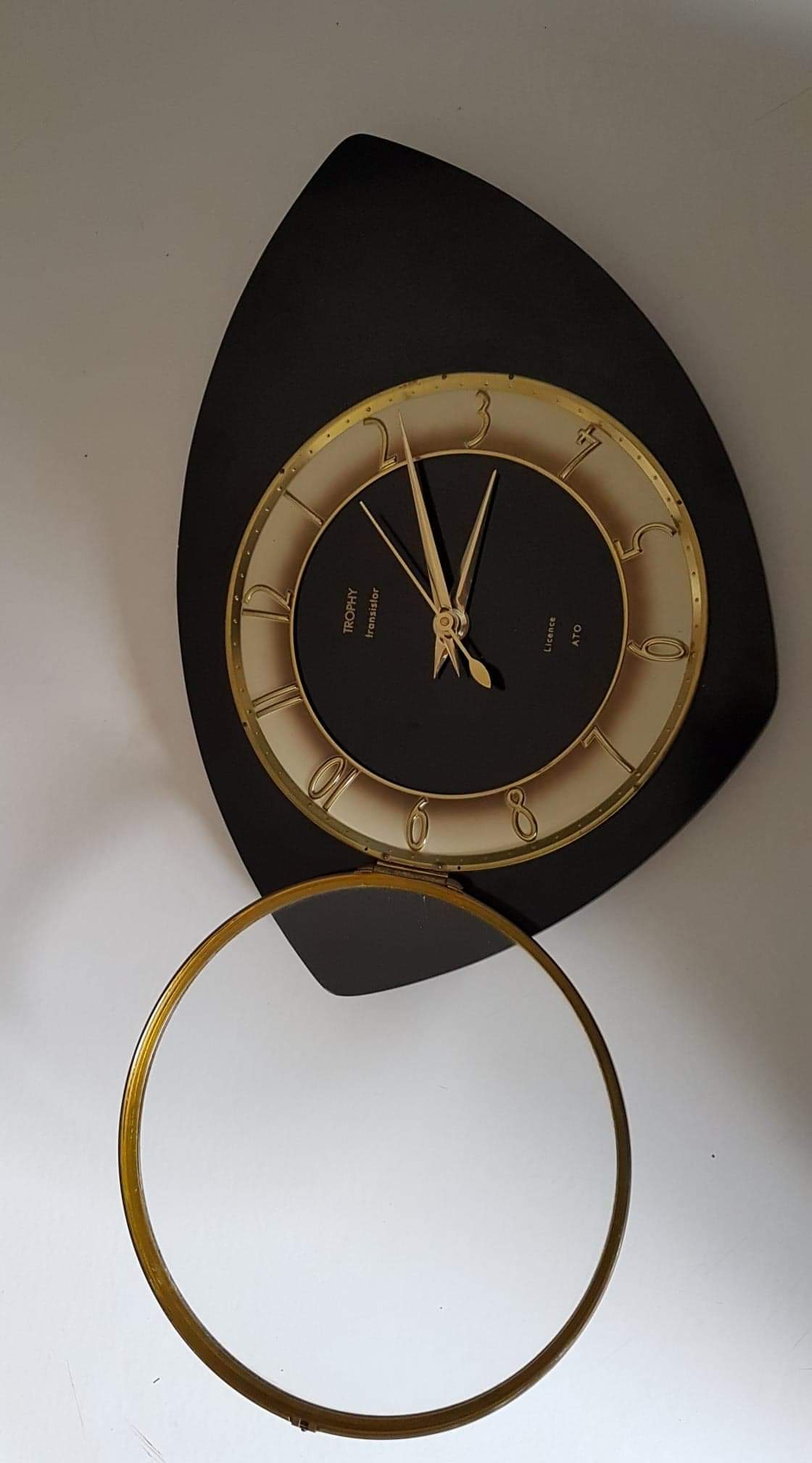 Black and gold formica wall pendulum mark Trophy Transistor