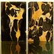 Pair of Portor marble bookends, black and golden yellow