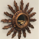 Miroir soleil en bois doré français 70s