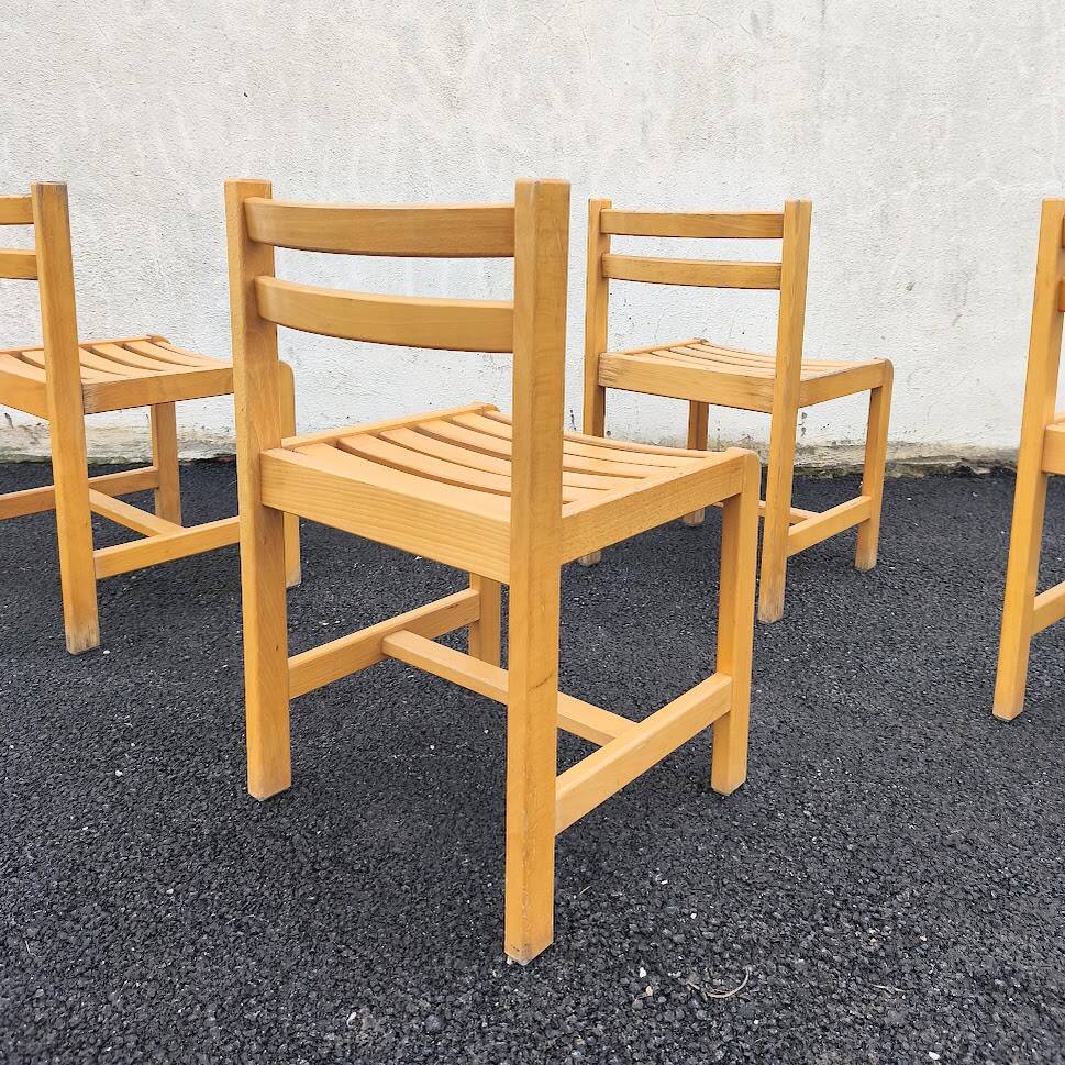 Set of 4 varnished wooden chairs, André Sornay