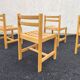 Set of 4 varnished wooden chairs, André Sornay
