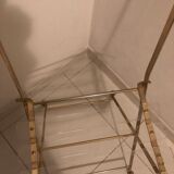 Folding chair in plexiglass and brass