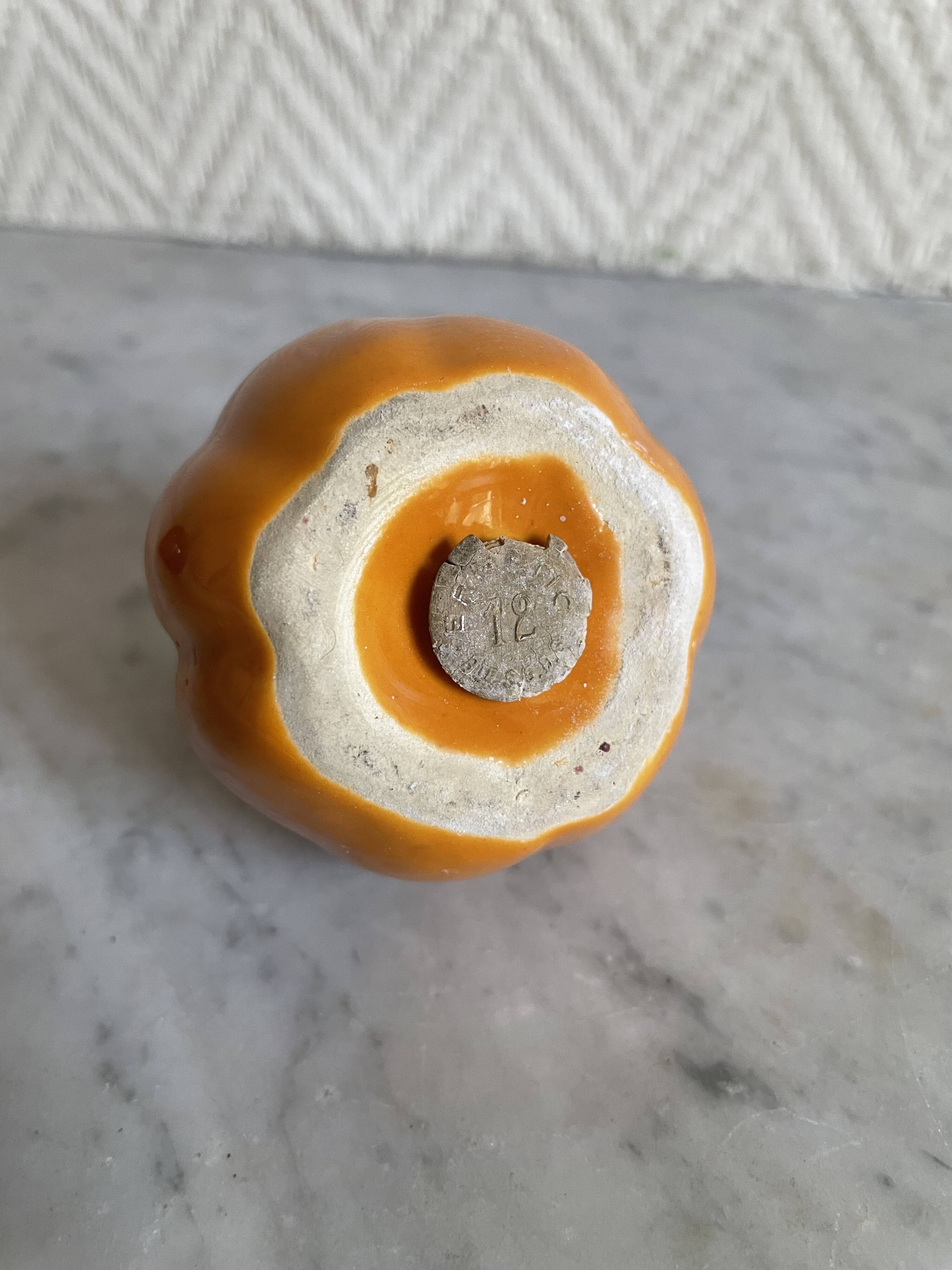 Set of ceramic salt and pepper shakers in the shape of a pumpkin tomato