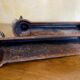 Pair of antique fire dogs with lion heads - patinated cast iron