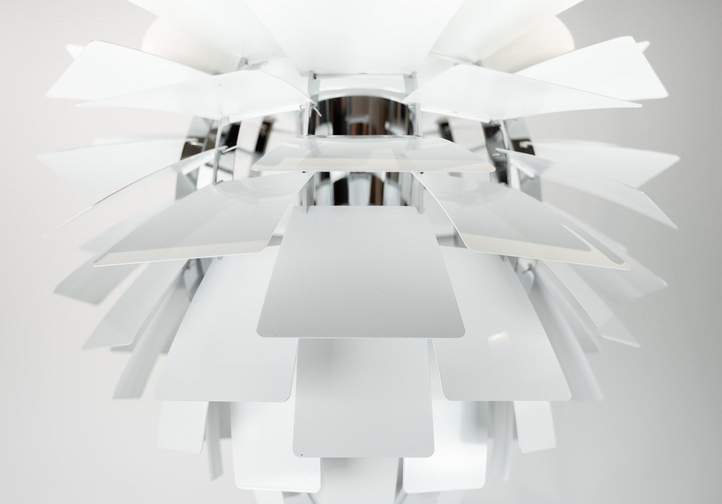 White artichoke, Ø48, designed by Poul Henningsen in 1958 and manufactured by Louis Poulsen.