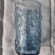 Blue glass with fruit relief decoration