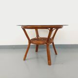 Vintage round smoked glass and rattan coffee table from the 70s