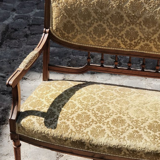 Old yellow velvet bench