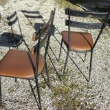 Pair of metal and imitation leather chairs 1950