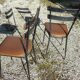 Pair of metal and imitation leather chairs 1950