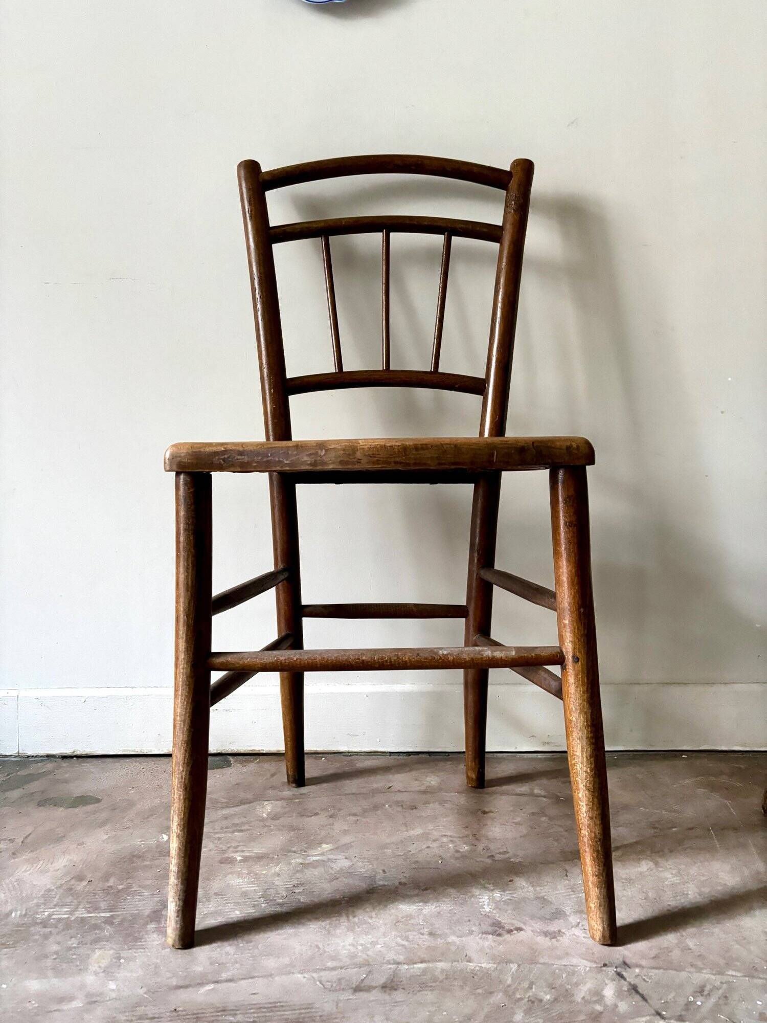 Wooden and cane bistro chair