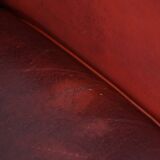 Set of 2 red-colored design armchairs made of sheepskin leather