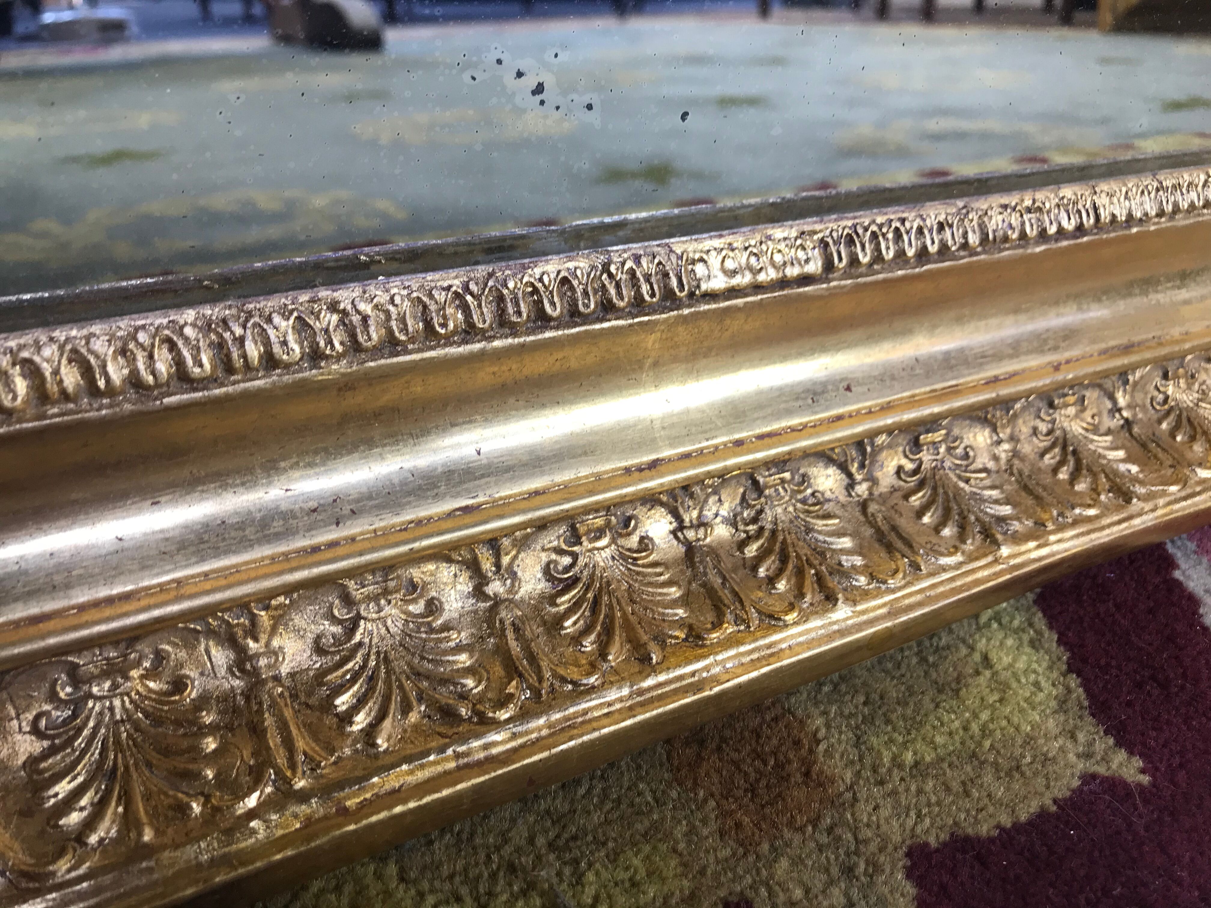 Empire mirror with palmettes gold leaf restored