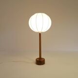 Mid-century solid teak table lamp from the 1960s Sweden.