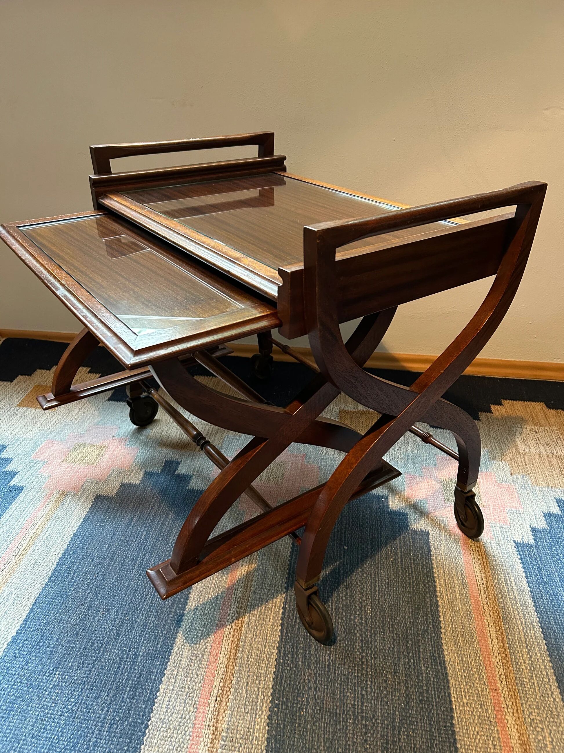 Teak service trolley with nesting table, mid-century modernism.