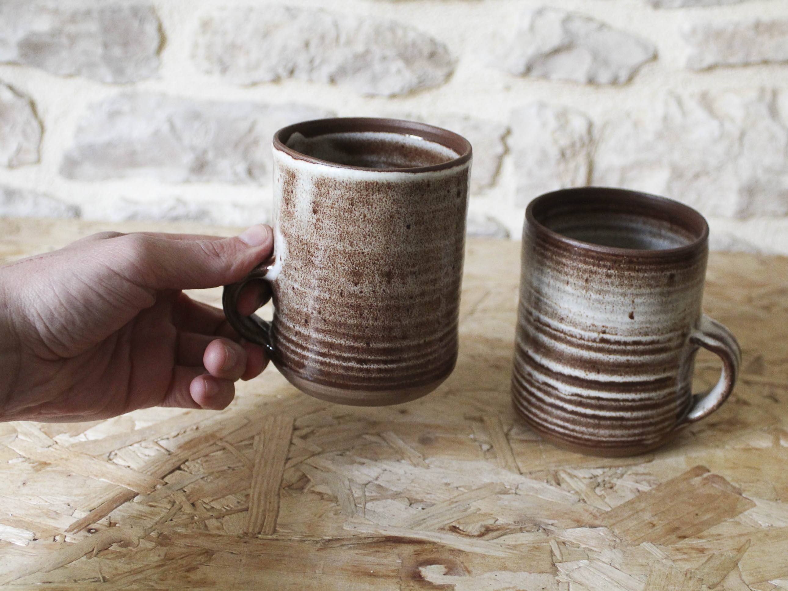 Pair of Roger Jacques Puisaye enameled stoneware cups