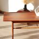 Vintage Scandinavian coffee table in teak and rattan – Danish design from the 1960s.