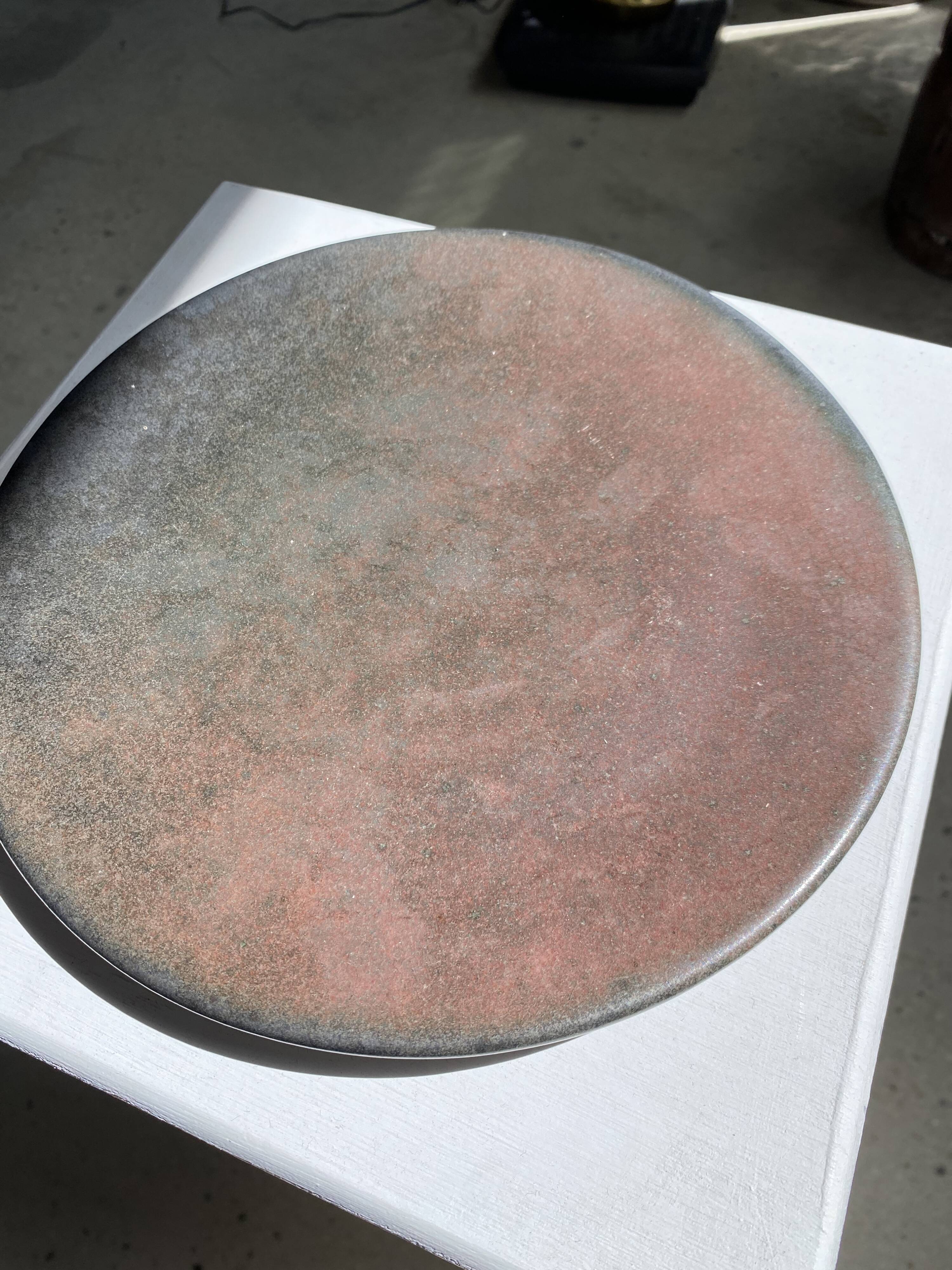 Series of 7 brown ceramic plates