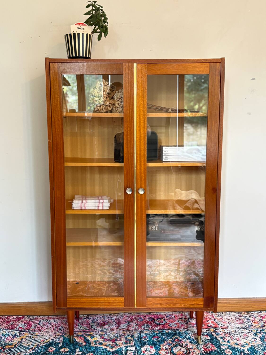 70s glass-fronted bookcase