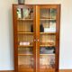 70s glass-fronted bookcase