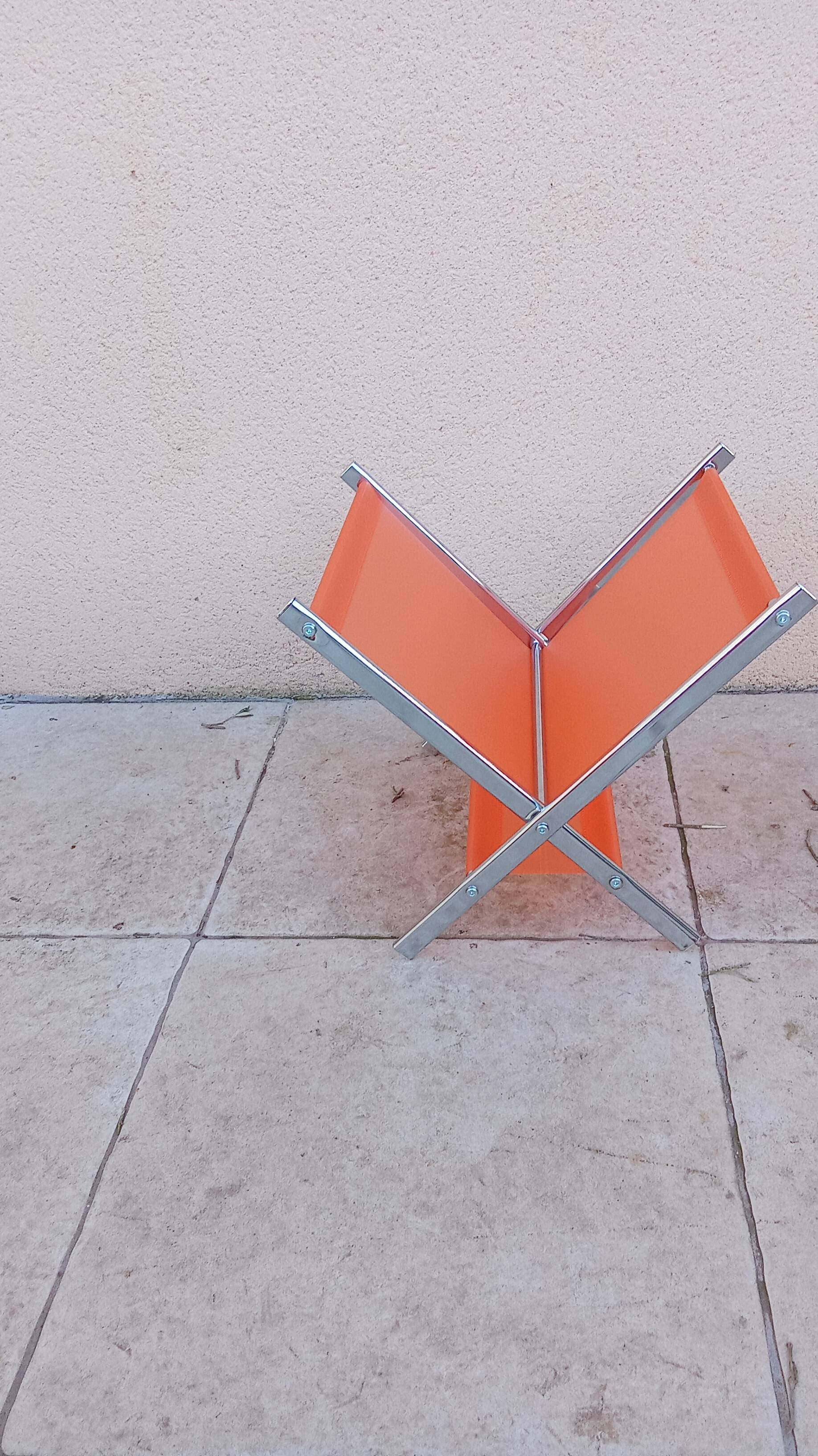 Vintage chrome and orange magazine rack from the 70s and 80s