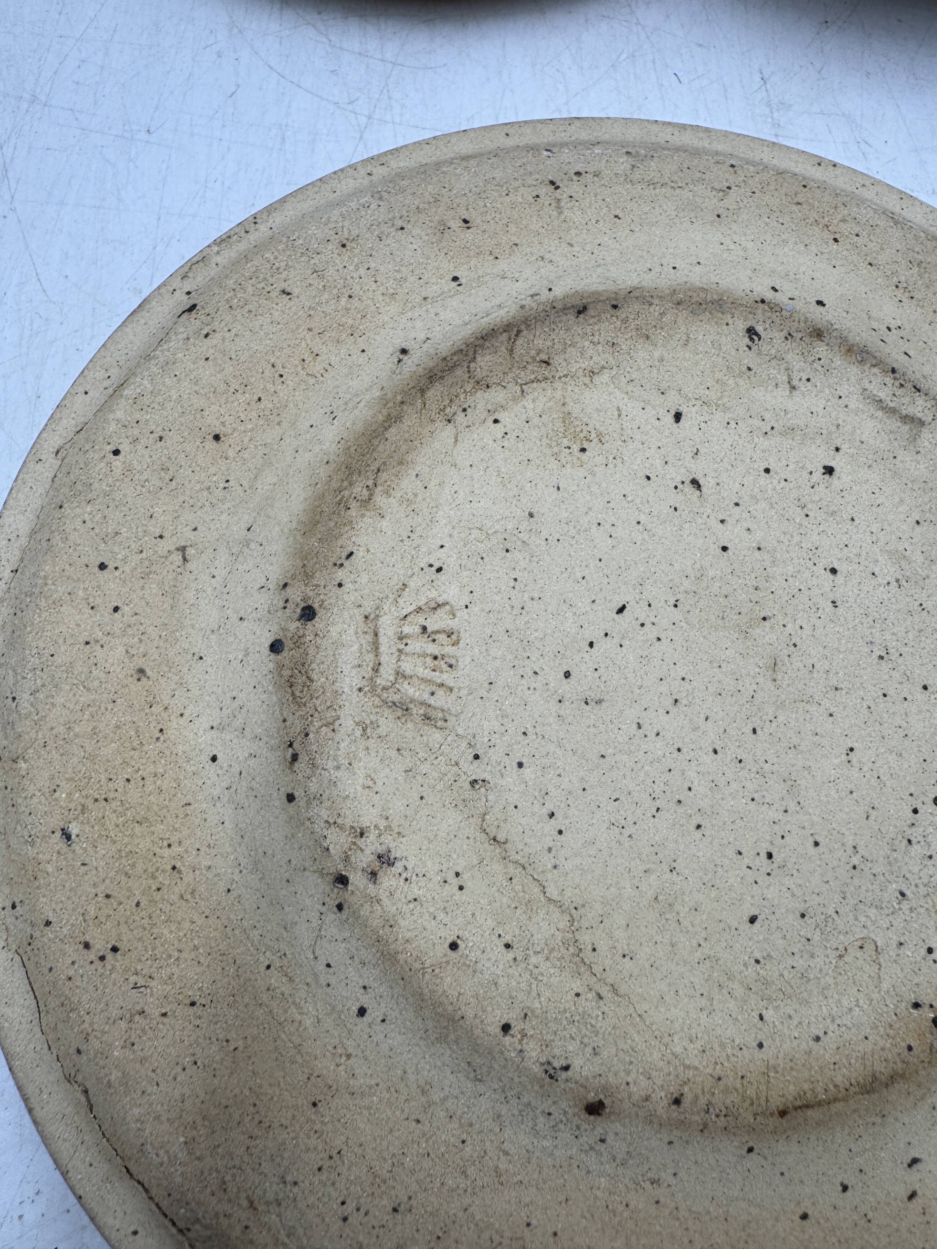 Pierre Digan 8 black stoneware plates from the 70s