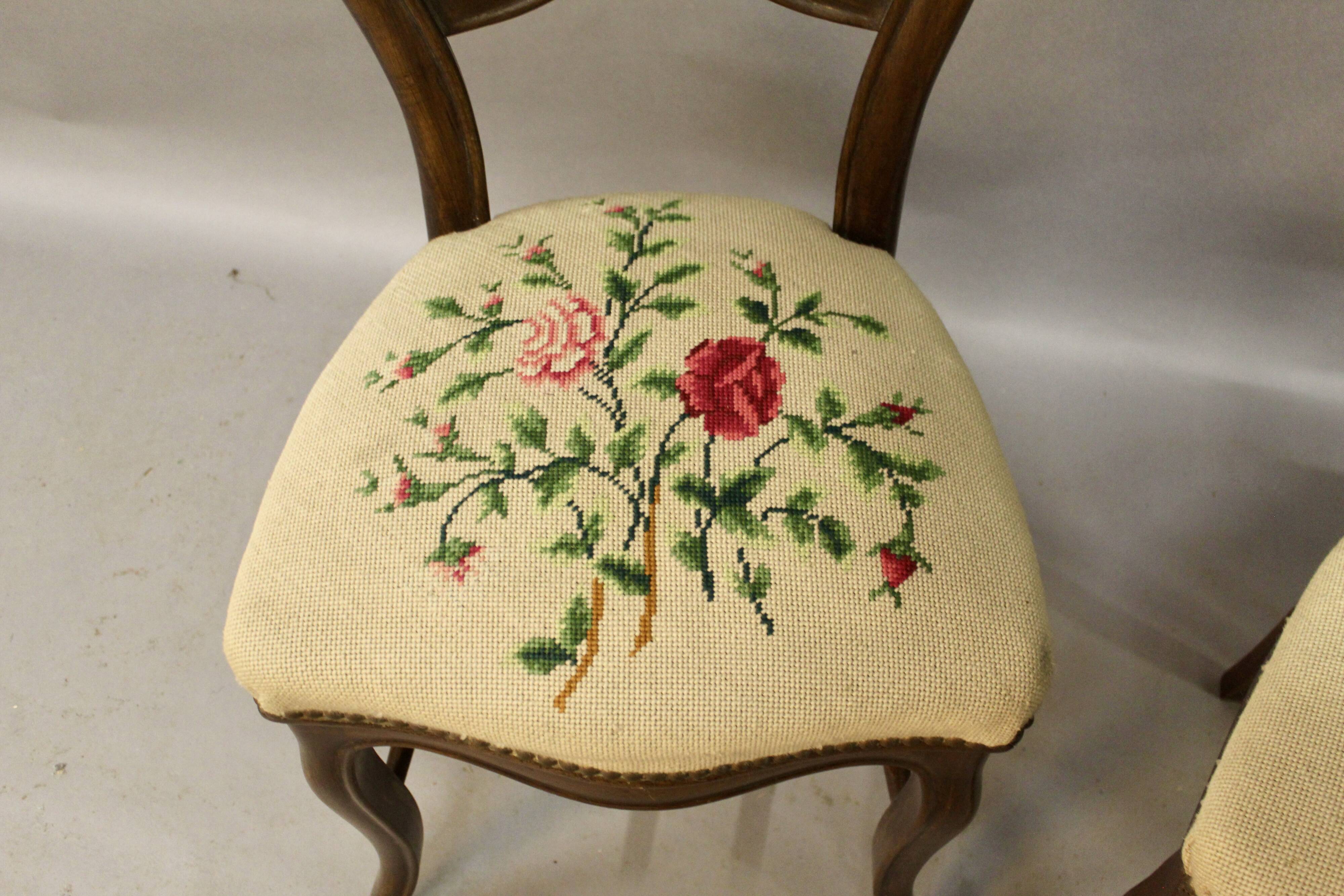 Pair of Louis Philippe chairs with petit point tapestry