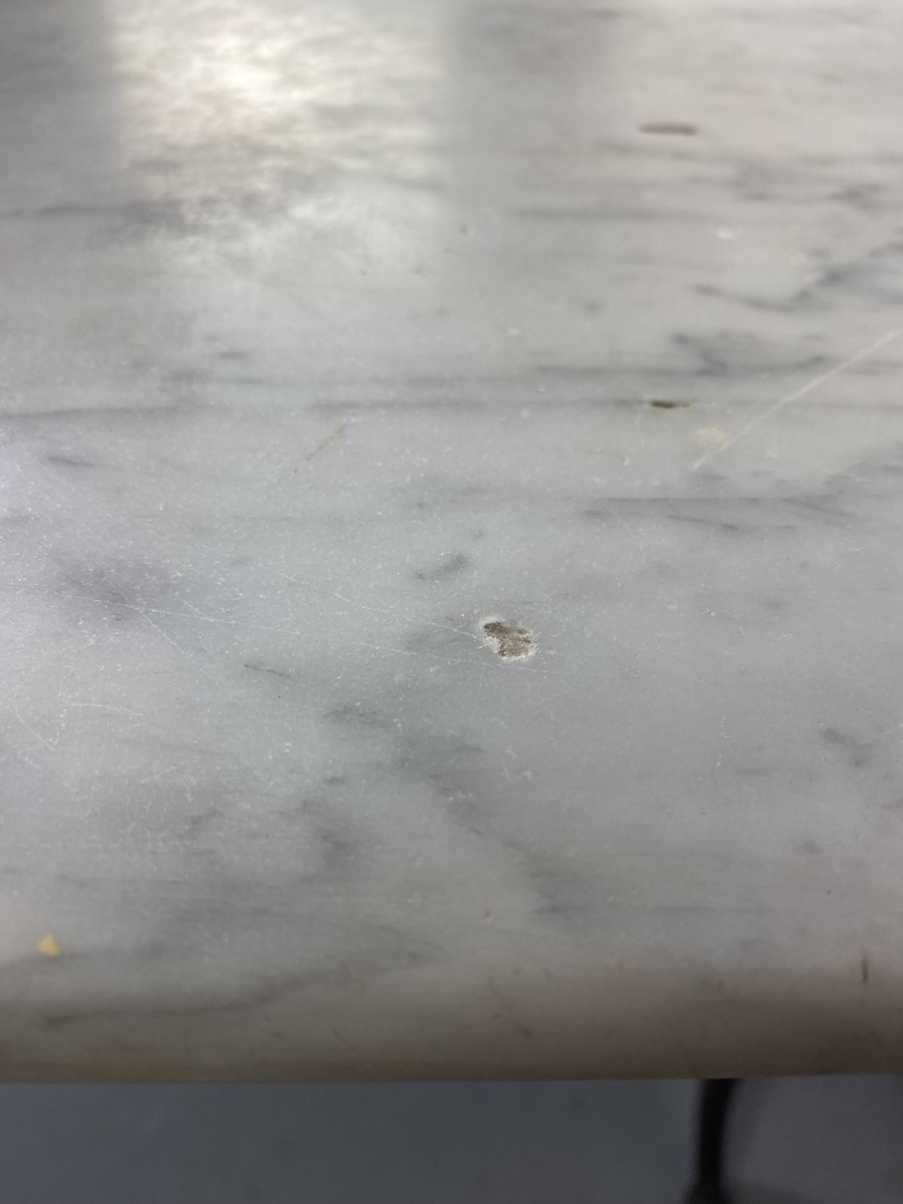 Set of two bistro tables in marble and wrought iron