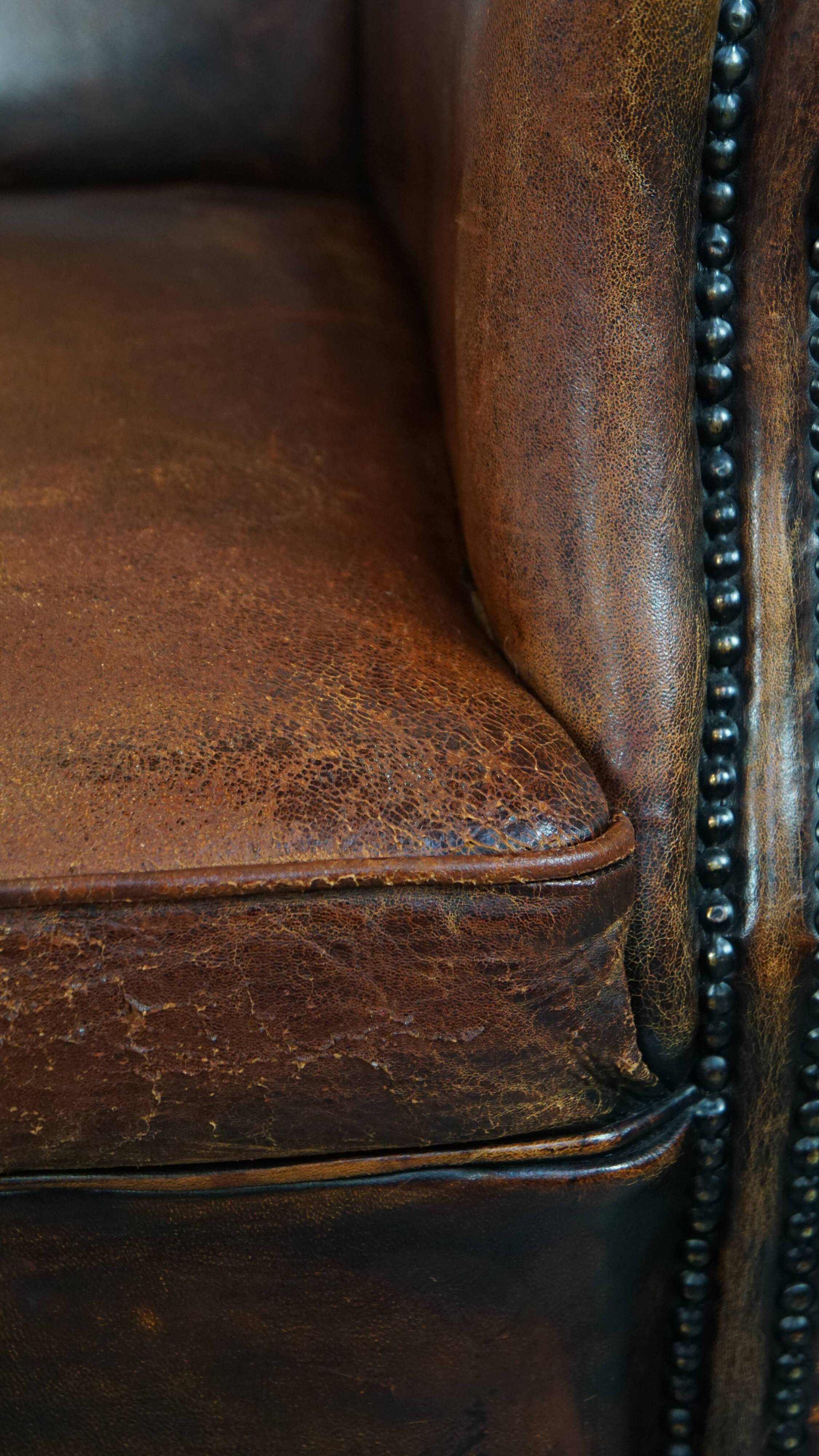Vintage sheep leather wingback chair